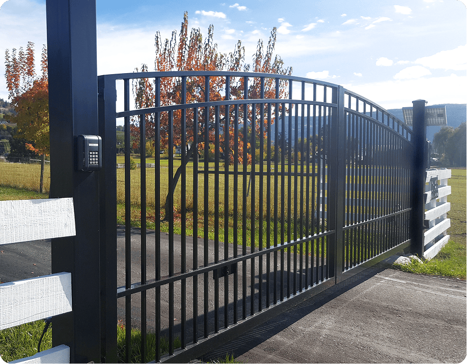 Black metal gate with keypad entry